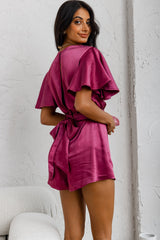 Unconditional Plunging Wrap Style Romper Fuchsia