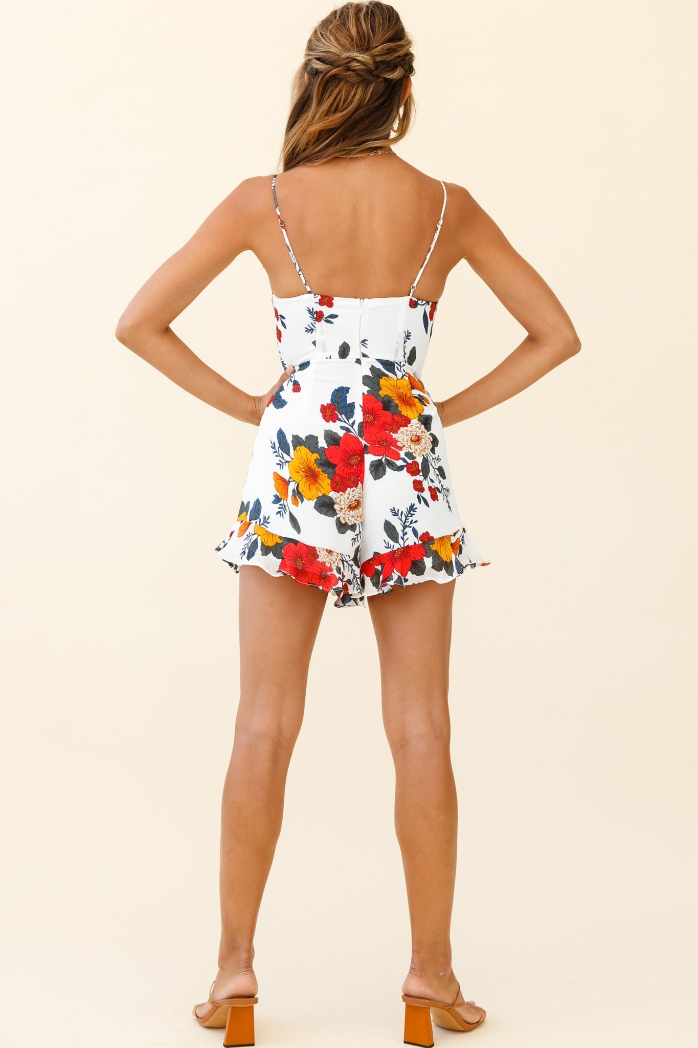 Janie Ruched Bust Ruffle Hem Romper Floral Bouquet Print White