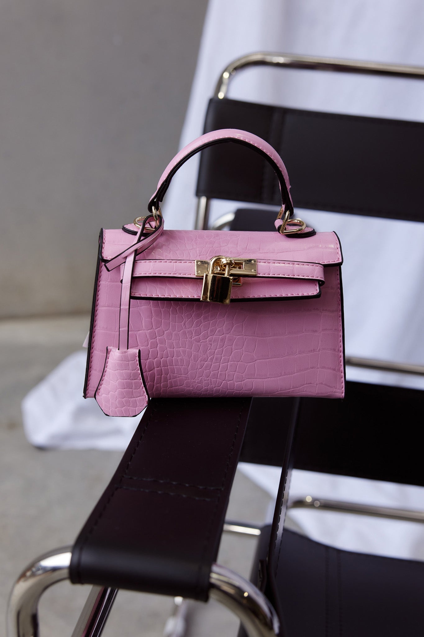 Peta And Jain Hedi Gold Lock Handbag Pink